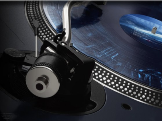 Turntable tonearm playing a vinyl record